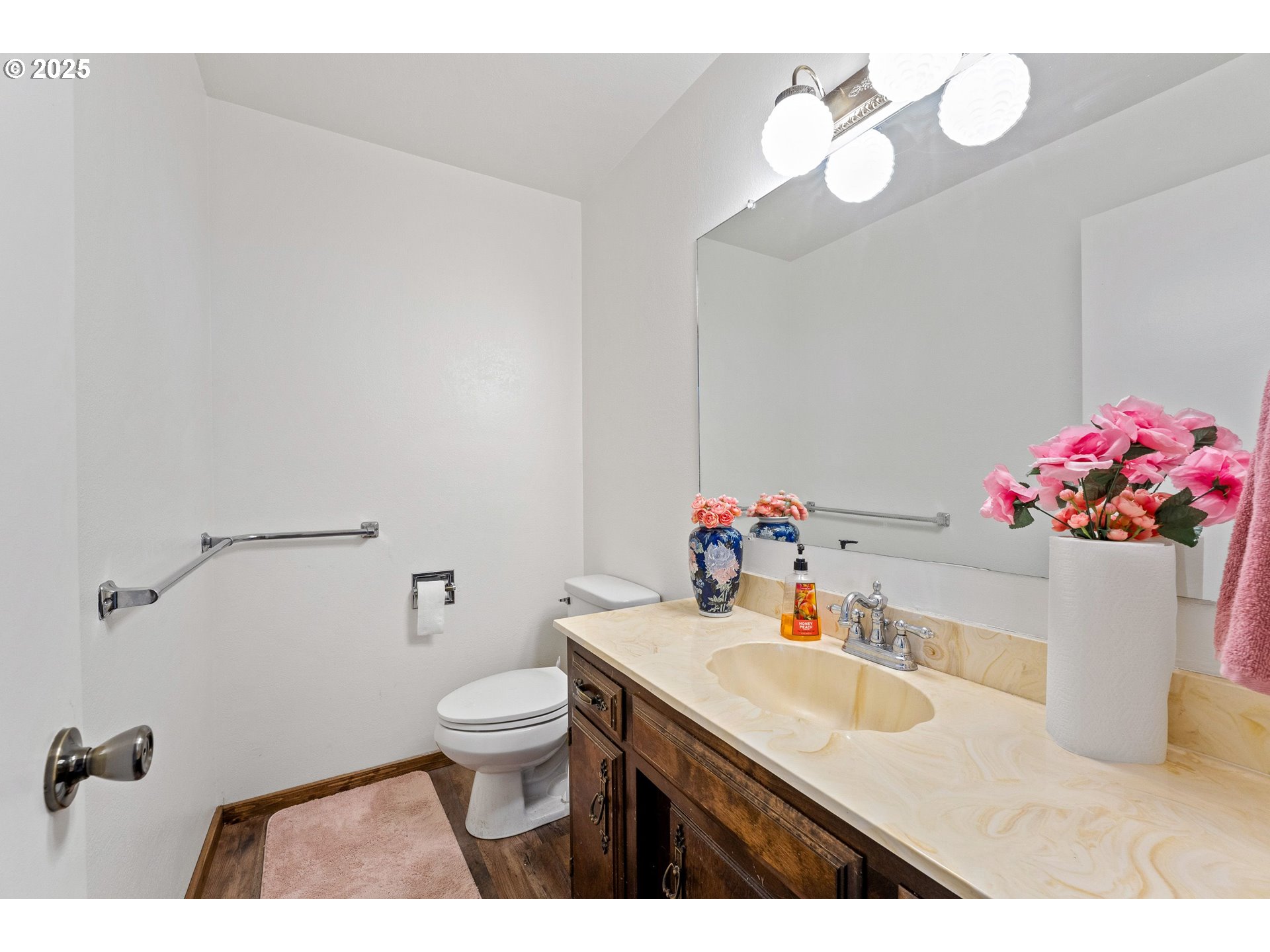109 Hickory Drive Rogue River, OR 97537 - Photo 17 of 28 a bathroom with a sink vanity mirror and toilet