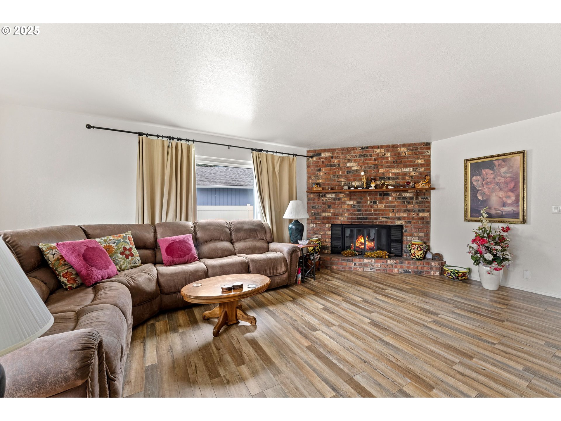 109 Hickory Drive Rogue River, OR 97537 - Photo 5 of 28 a living room with furniture and a fireplace