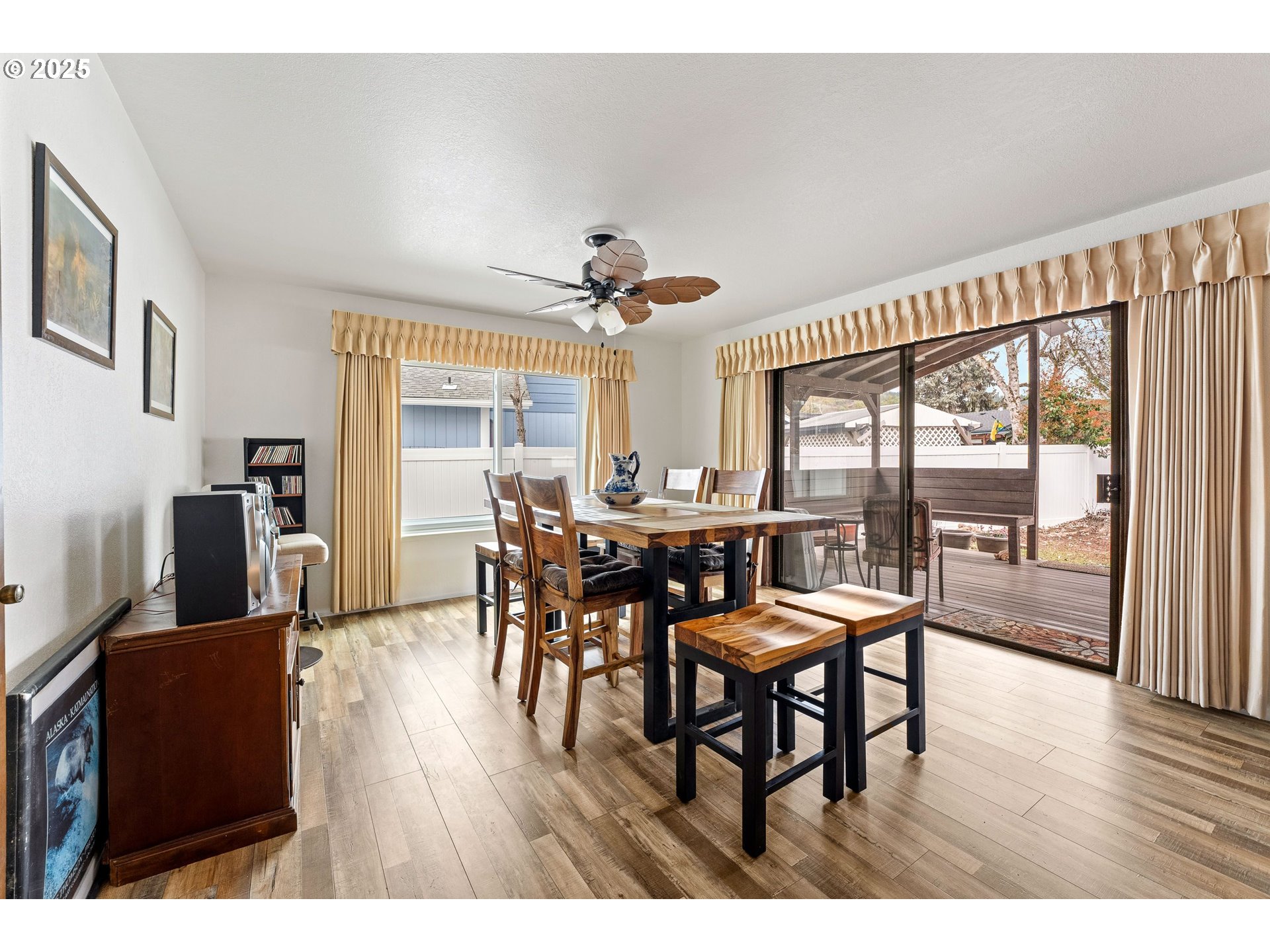 109 Hickory Drive Rogue River, OR 97537 - Photo 10 of 28 a view of a dining room with furniture window and wooden floor