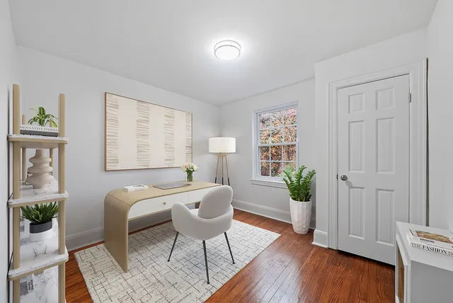 a bedroom with a bed and a fireplace