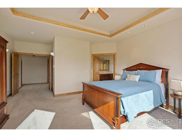 a bedroom with a bed and a cabinets