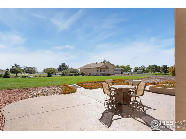 a view of swimming pool and lounge chair