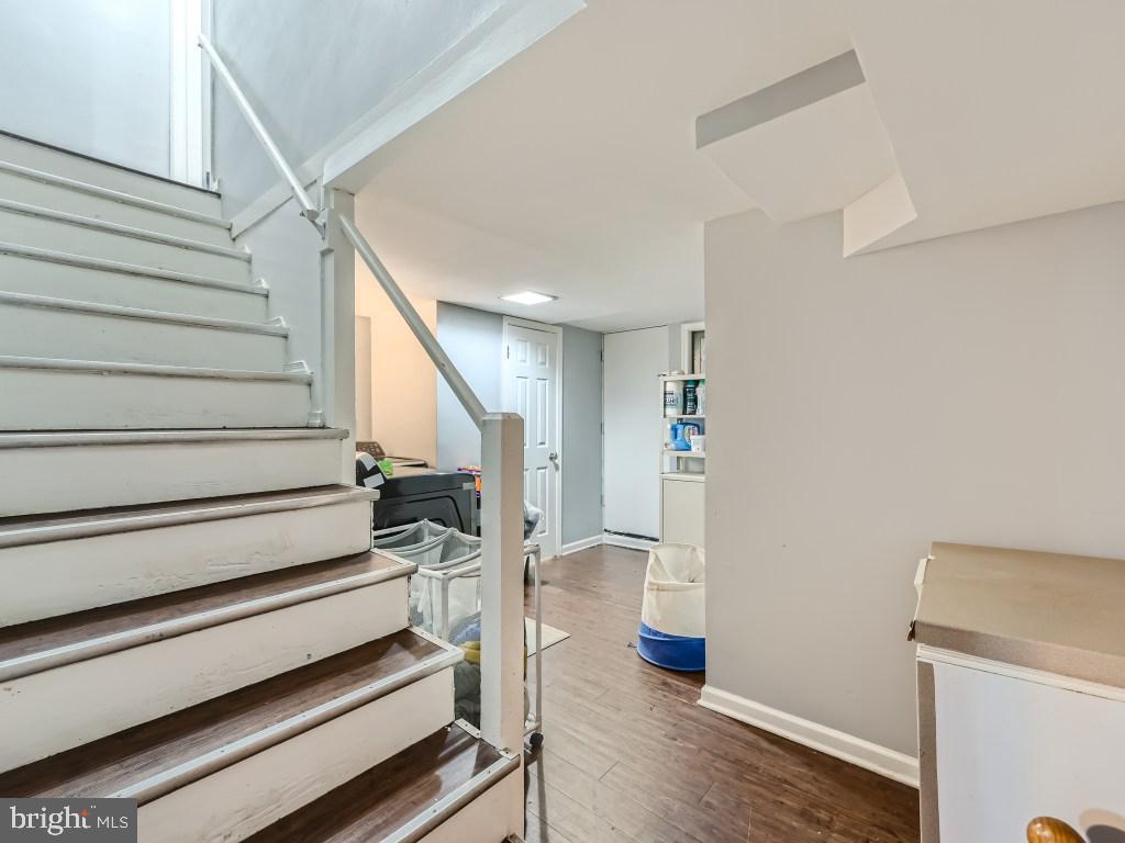 749 South Woodington Road Baltimore, MD 21229 - Photo 5 of 25 Staircase from lower level to Main floor
