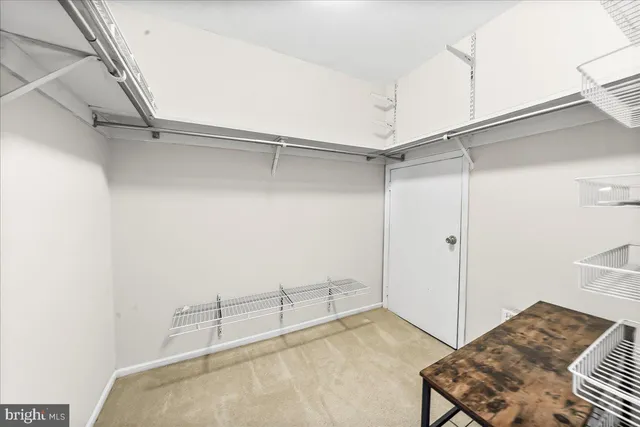 a view of a room with racks on the wall