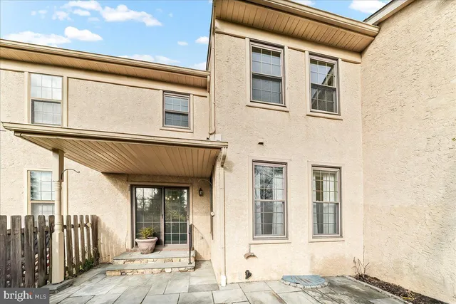 a view of a backyard of the house