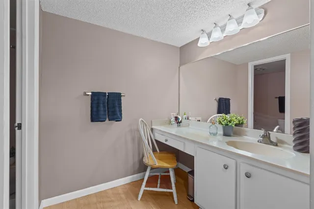 a bathroom with a toilet a sink and bathtub