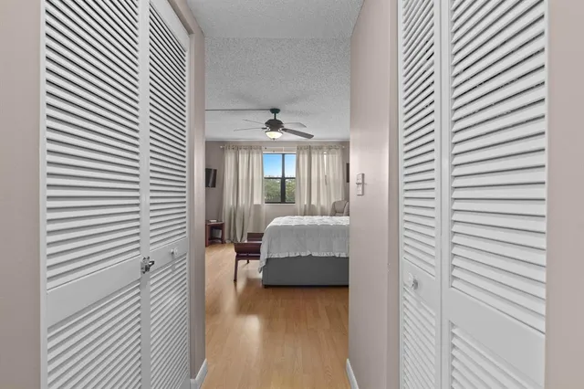 a bedroom with furniture and window