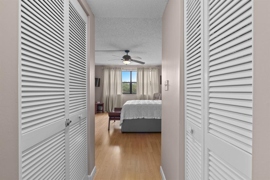 16051 Blatt Boulevard, Unit 212 Weston, FL 33326 - Photo 36 of 52 a en suite bathroom with a sink and mirror