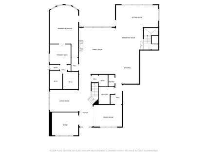 an aerial view of a house with garden space and outdoor seating