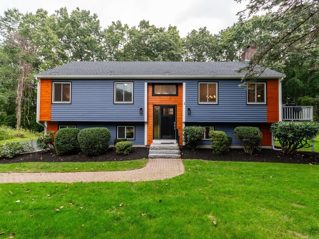65 Overlook Drive Framingham, MA 01701 - Photo 1 of 35 a front view of a house with a yard