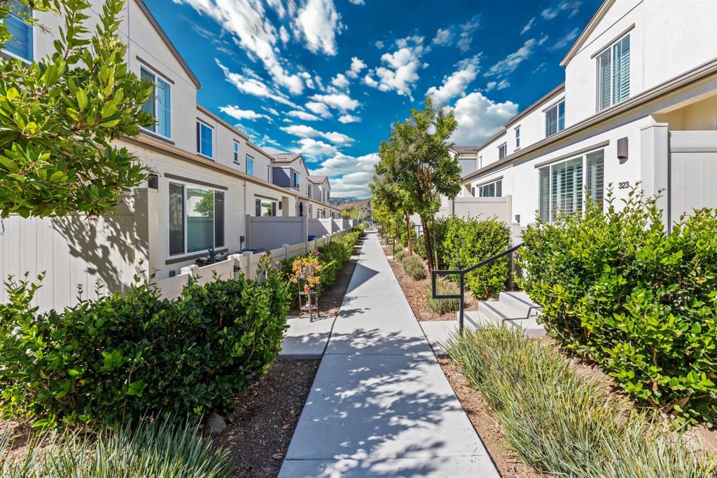 323 Citrine Trail Fallbrook, CA 92028 - Photo 2 of 21 a view of a pathway with a house