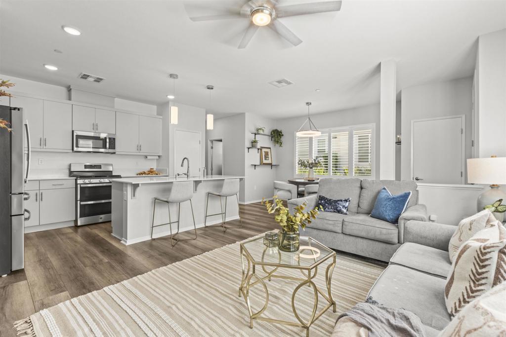 323 Citrine Trail Fallbrook, CA 92028 - Photo 6 of 21 a living room kitchen with furniture and kitchen view