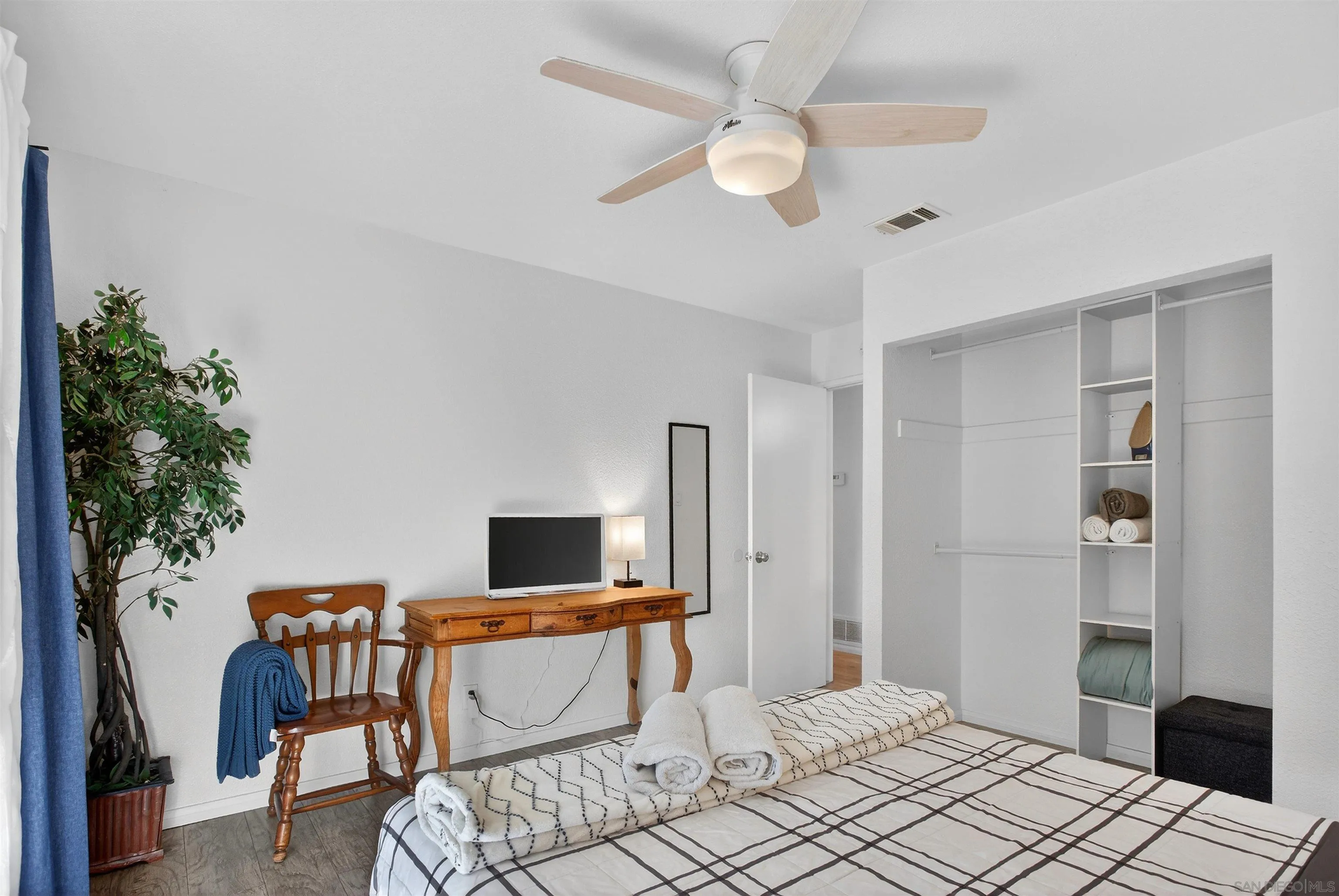 3548 De Leone Road San Marcos, CA 92069 - Photo 19 of 46 a bedroom with furniture and a window