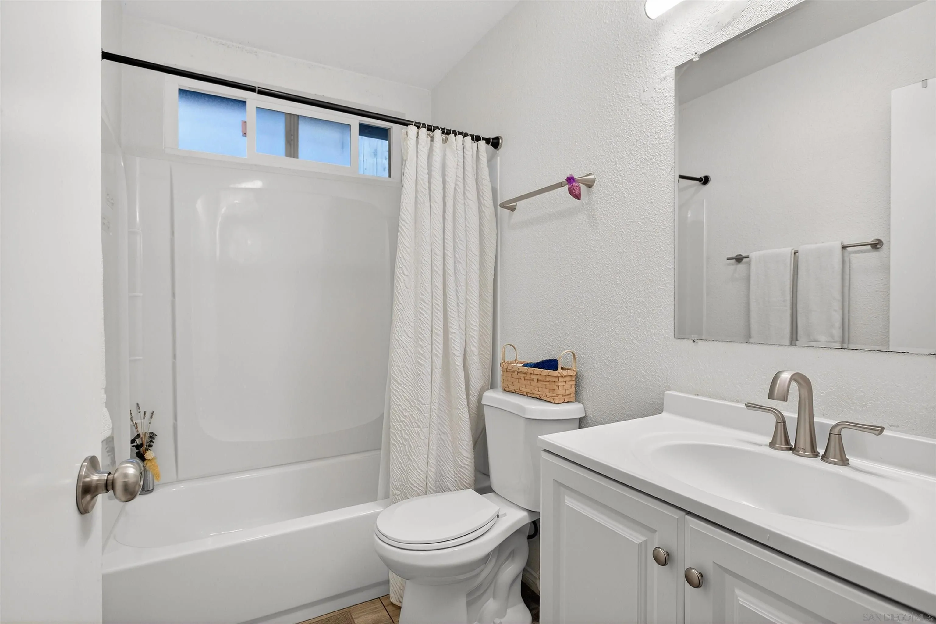 3548 De Leone Road San Marcos, CA 92069 - Photo 21 of 46 a bathroom with a sink toilet and shower