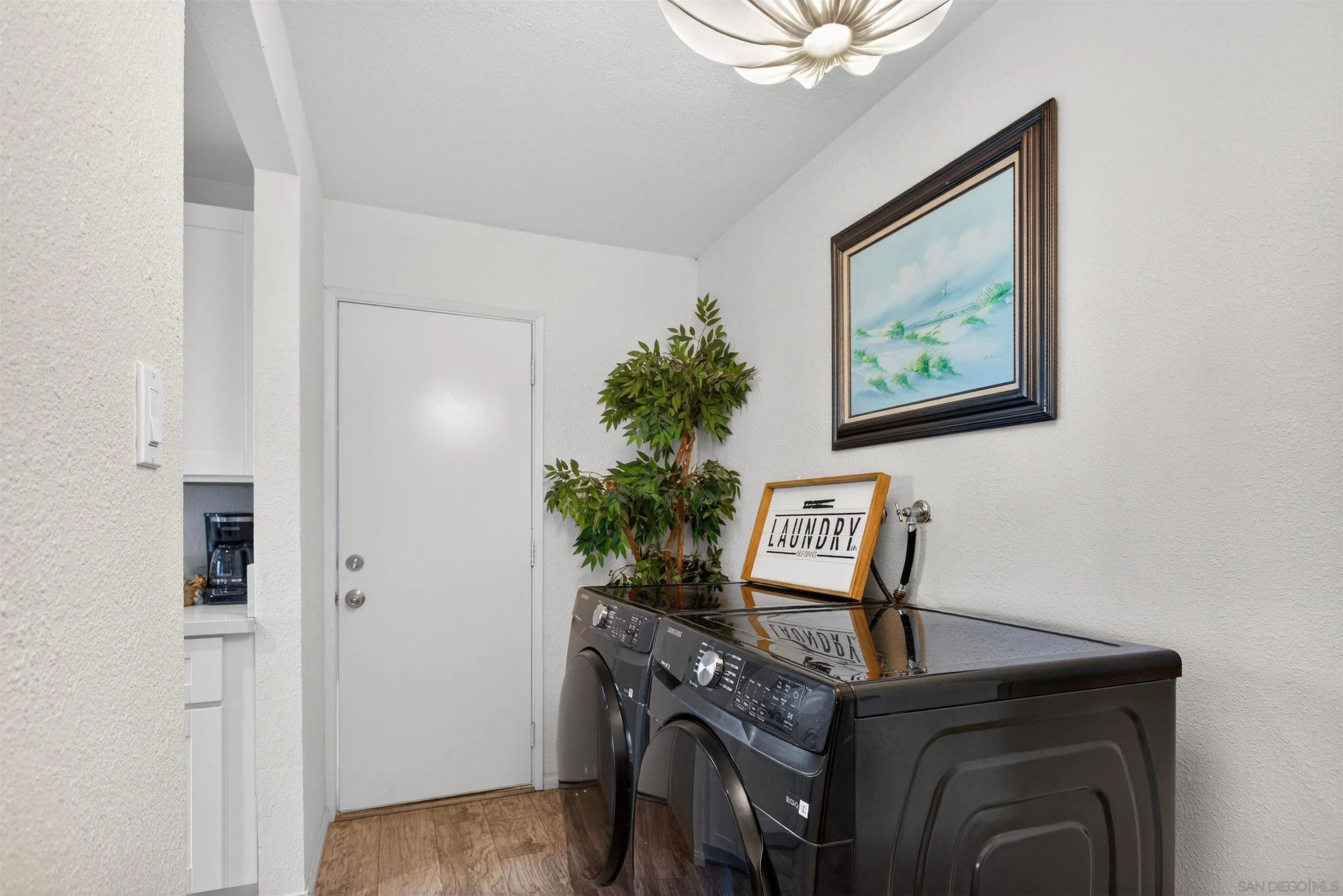 3548 De Leone Road San Marcos, CA 92069 - Photo 24 of 46 a view of a workspace with furniture and a potted plant