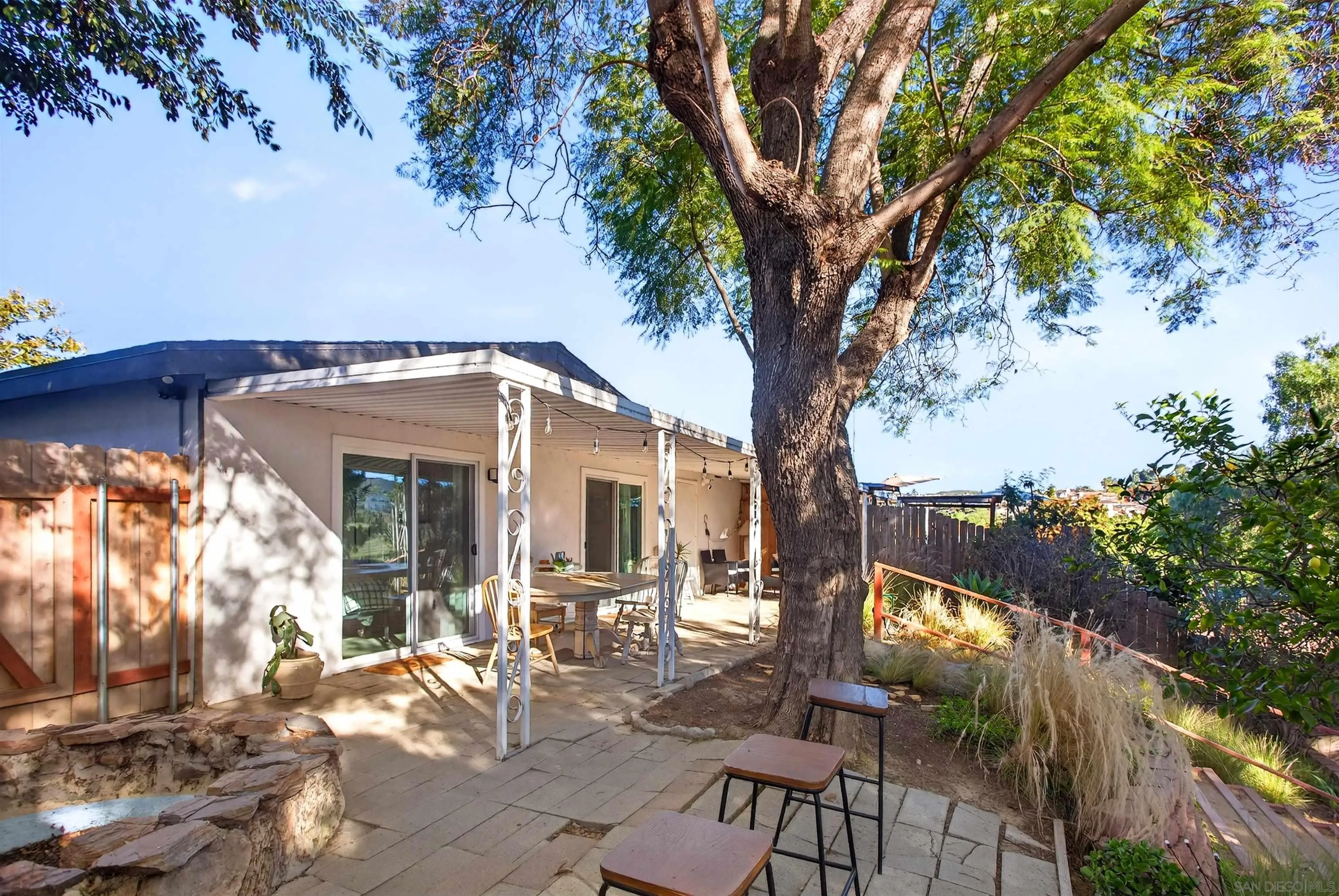3548 De Leone Road San Marcos, CA 92069 - Photo 31 of 46 a view of a house with backyard and sitting area