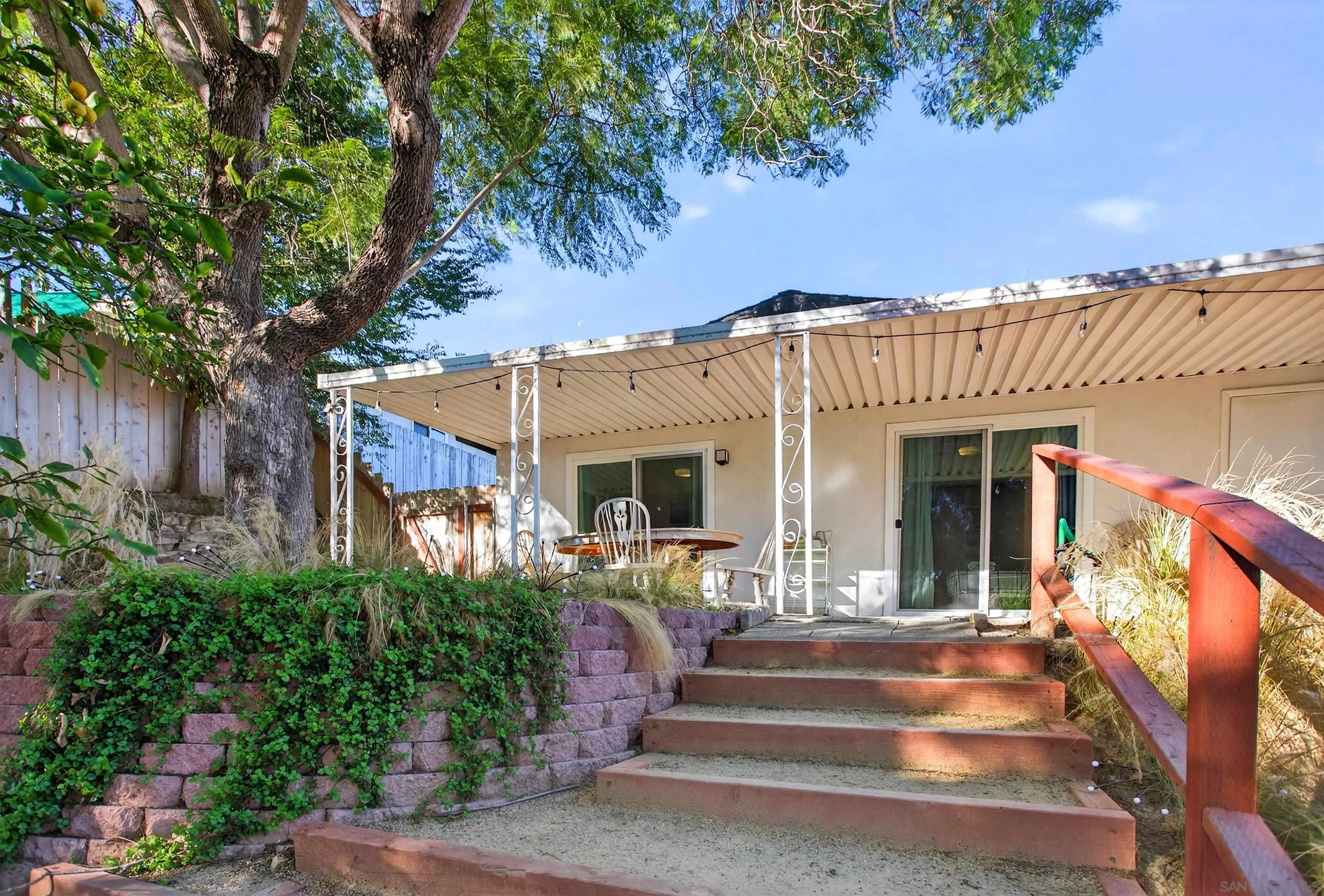 3548 De Leone Road San Marcos, CA 92069 - Photo 32 of 46 a view of a building with a porch