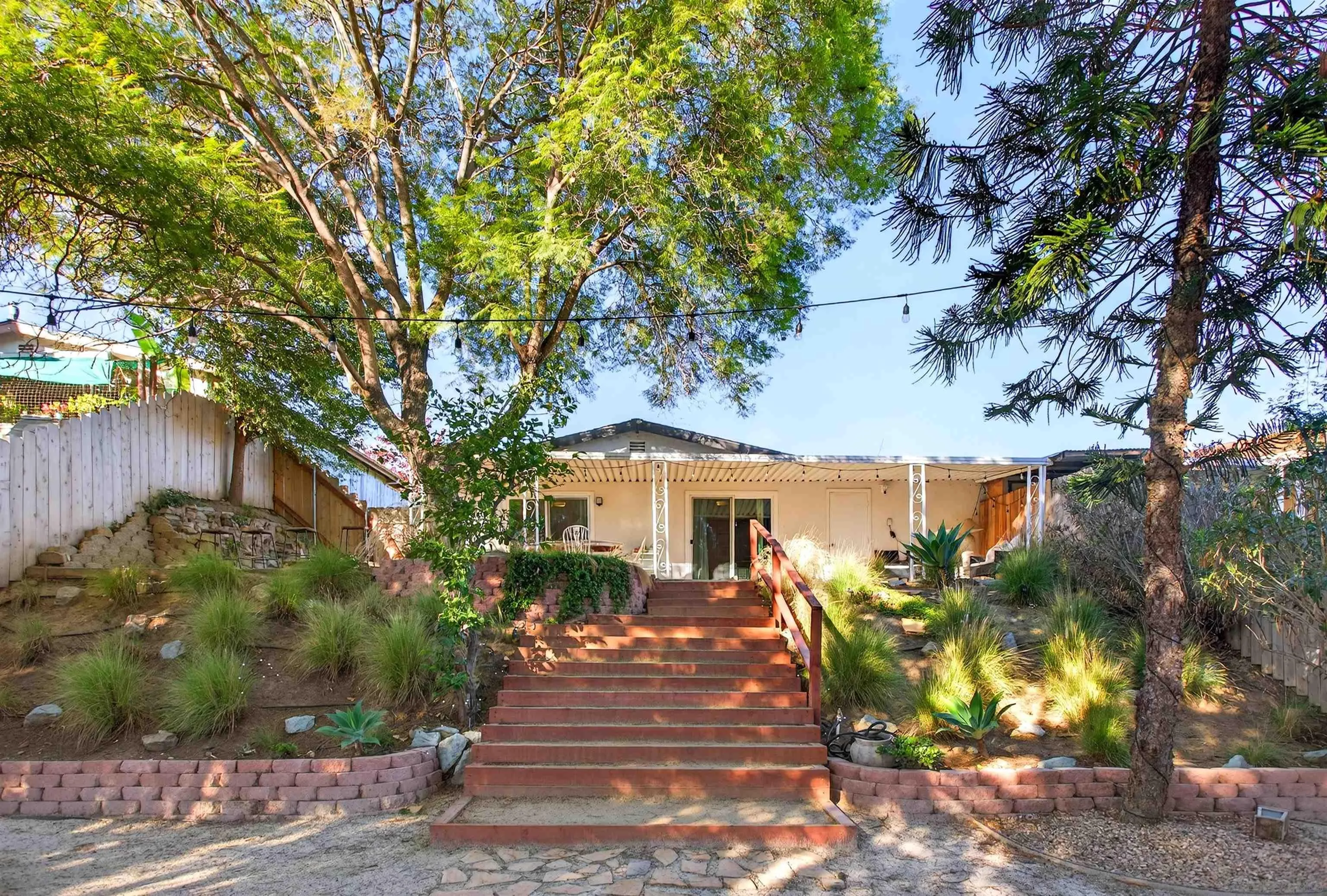 3548 De Leone Road San Marcos, CA 92069 - Photo 35 of 46 a front view of a house with garden