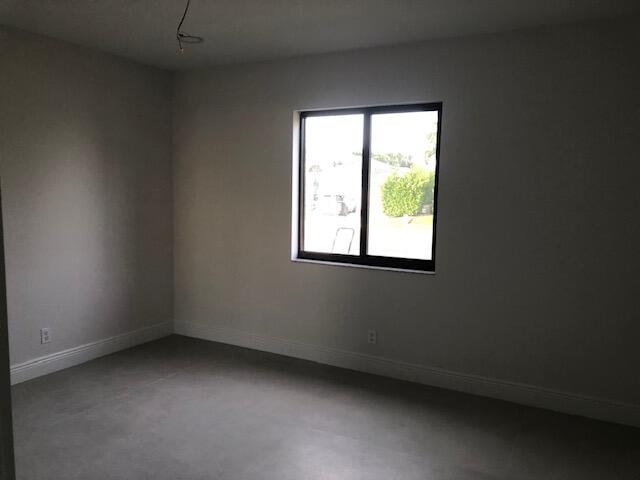 22171 Hollyhock Trail Boca Raton, FL 33433 - Photo 14 of 24 an empty room with a window