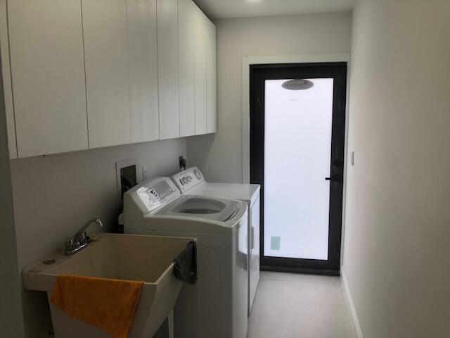 22171 Hollyhock Trail Boca Raton, FL 33433 - Photo 23 of 24 a utility room with dryer and washer