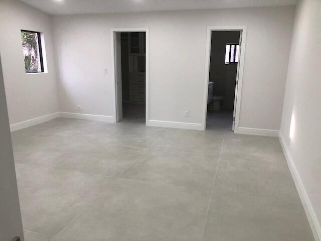 22171 Hollyhock Trail Boca Raton, FL 33433 - Photo 8 of 24 an empty room with windows