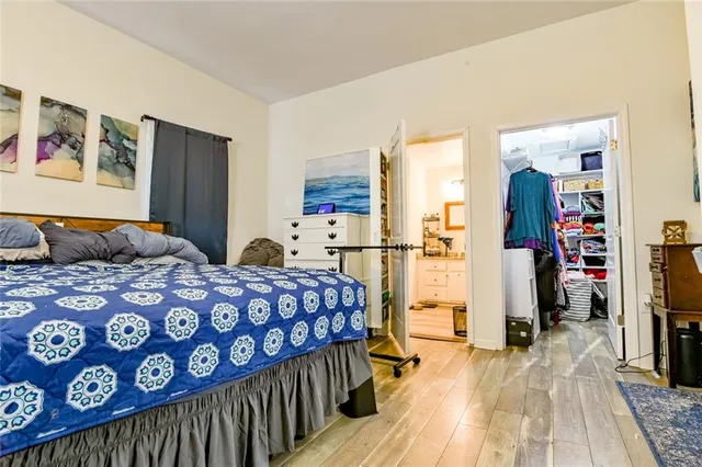 a bathroom with a toilet and a shower curtain