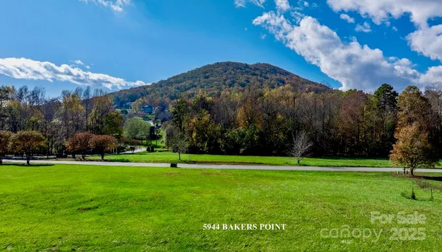 a view of a golf course with a house