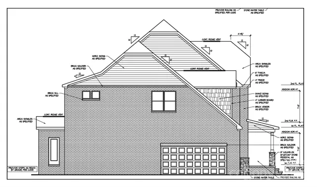 a black and white photo of a very nice looking building