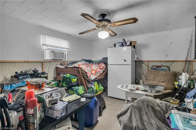 a view of a workspace with furniture