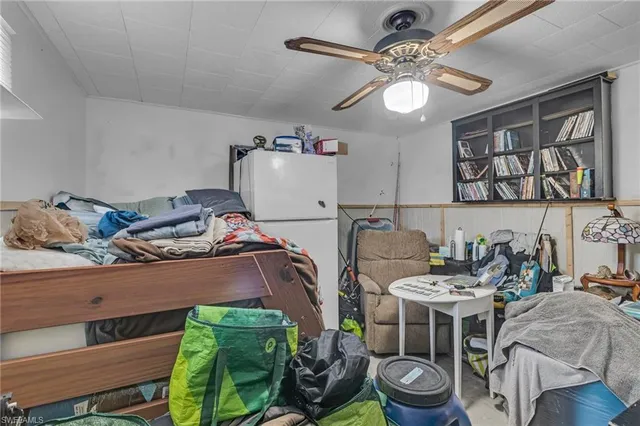 a kitchen with furniture and a chandelier