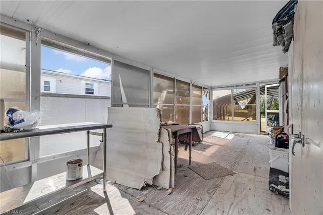 a view of workspace with wooden floor