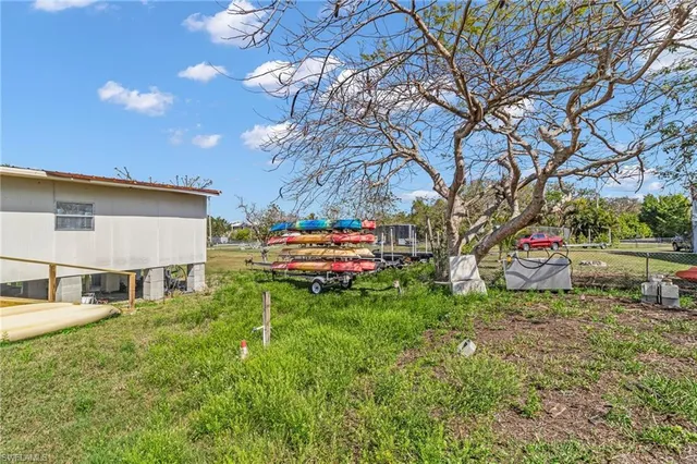 a childrens park with lots of swings and slides
