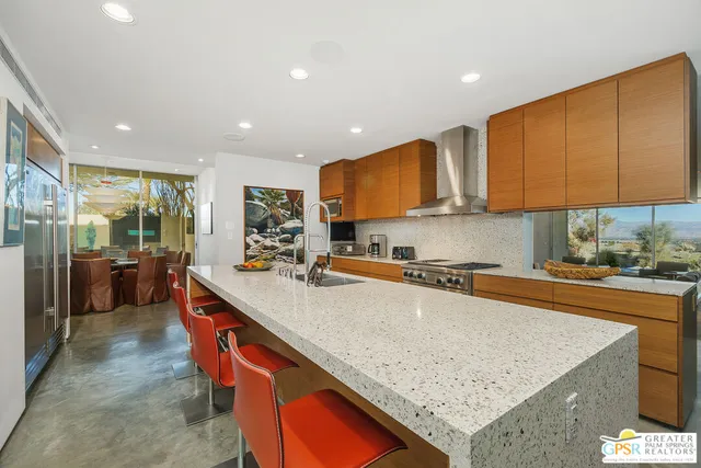 a bedroom with a bed and a view of bathroom