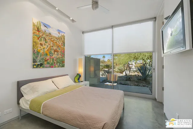 a bathroom with a tub sink and shower