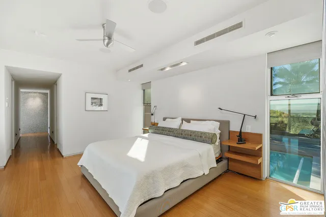 a view of balcony with furniture and outdoor kitchen
