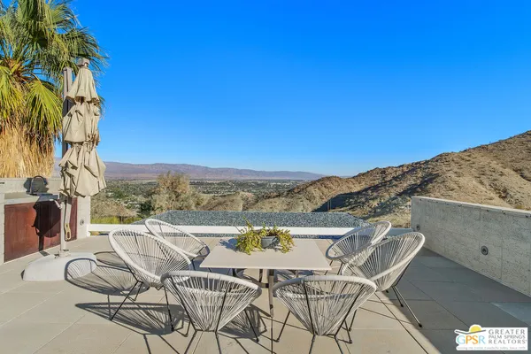 a view of a house with a patio