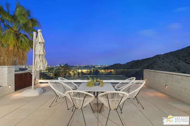 a view of a terrace with a garden