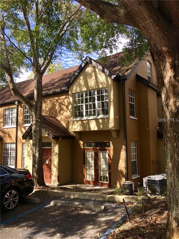 6416 Raleigh Street, Unit 2614 Orlando, FL 32835 - Photo 1 of 1 a front view of a house