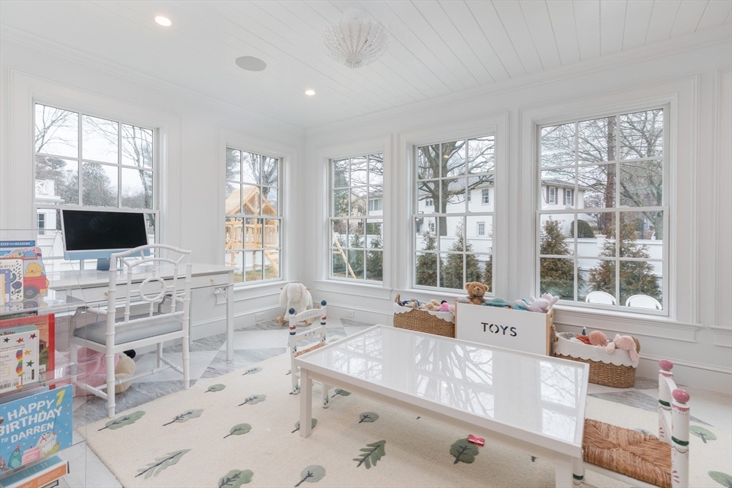 34 Chesterton Road Wellesley, MA 02481 - Photo 14 of 36 a large bathroom with a large window and a flat screen tv