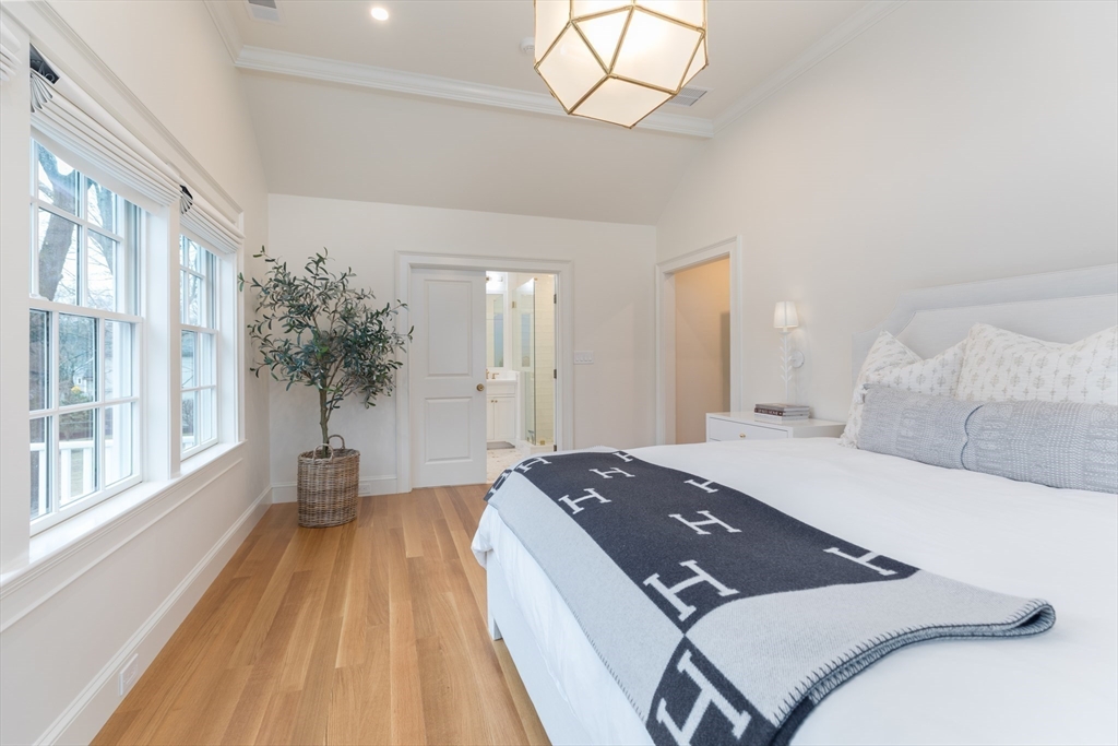 34 Chesterton Road Wellesley, MA 02481 - Photo 15 of 36 a spacious bedroom with a bed and a window