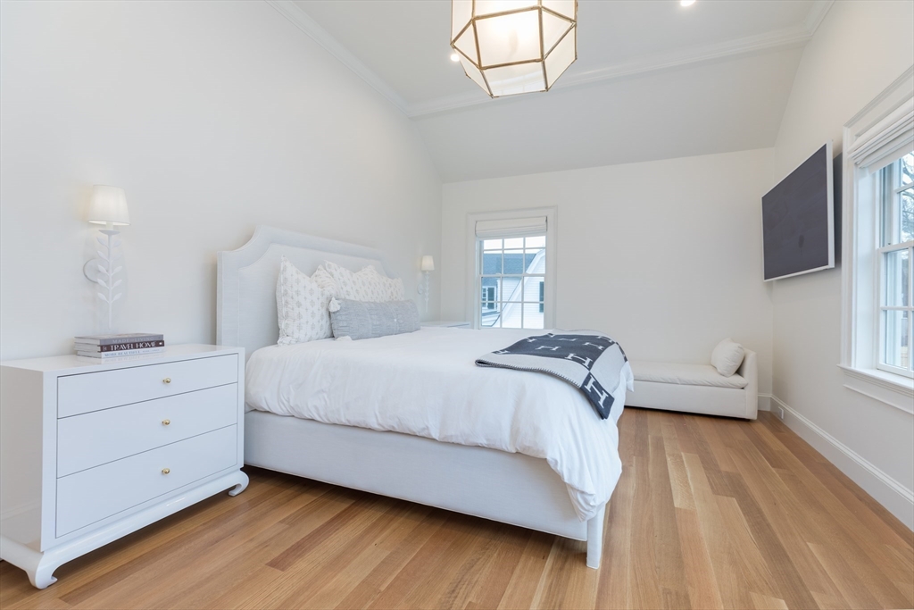 34 Chesterton Road Wellesley, MA 02481 - Photo 16 of 36 a spacious bedroom with a bed and a dresser