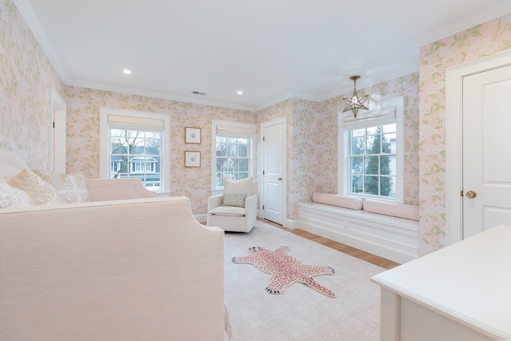34 Chesterton Road Wellesley, MA 02481 - Photo 19 of 36 a living room with furniture and large windows