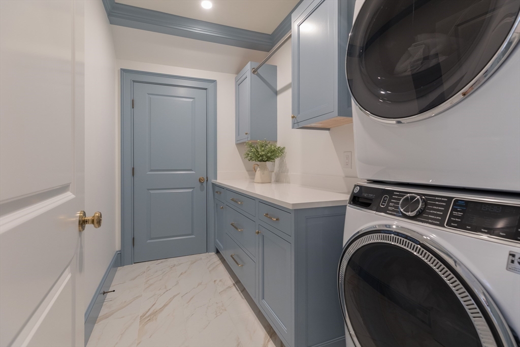 34 Chesterton Road Wellesley, MA 02481 - Photo 27 of 36 a utility room with dryer and washer