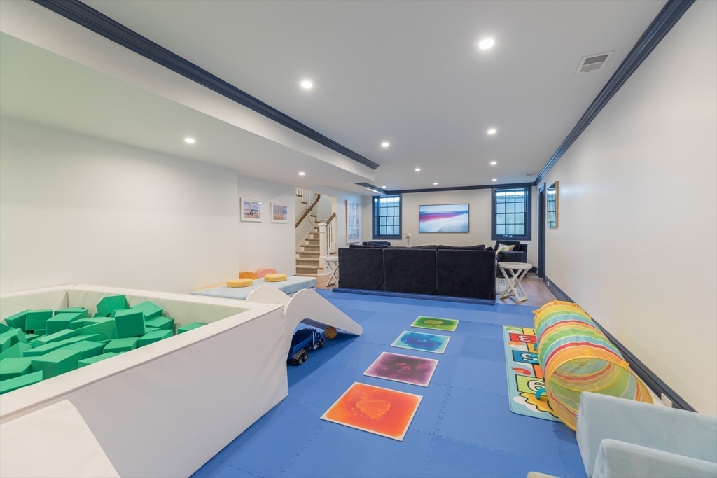 34 Chesterton Road Wellesley, MA 02481 - Photo 30 of 36 a room with furniture and a wooden floor