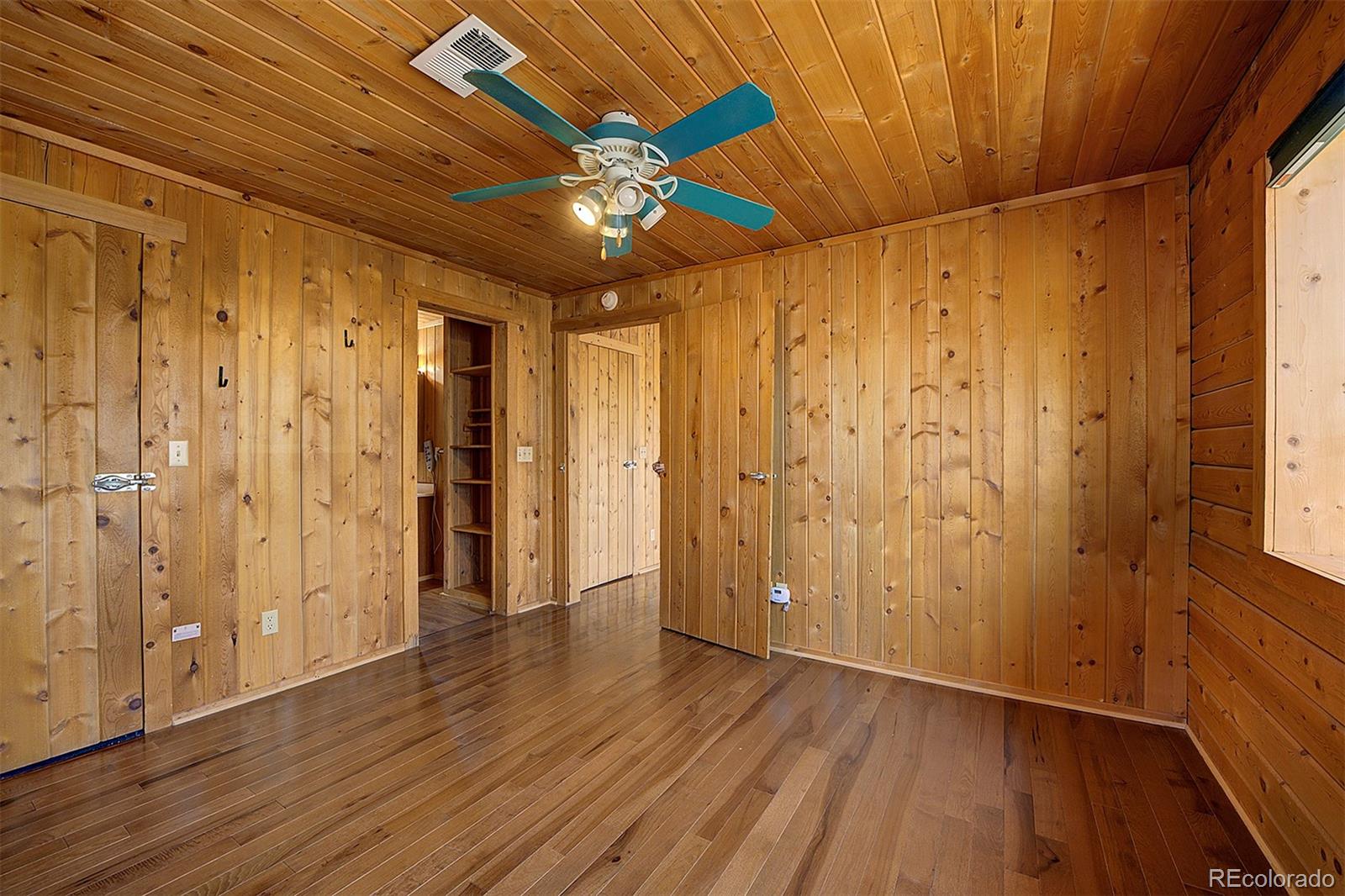 1536 Clark Road Bailey, CO 80421 - Photo 16 of 33 a view of entryway with wooden floor