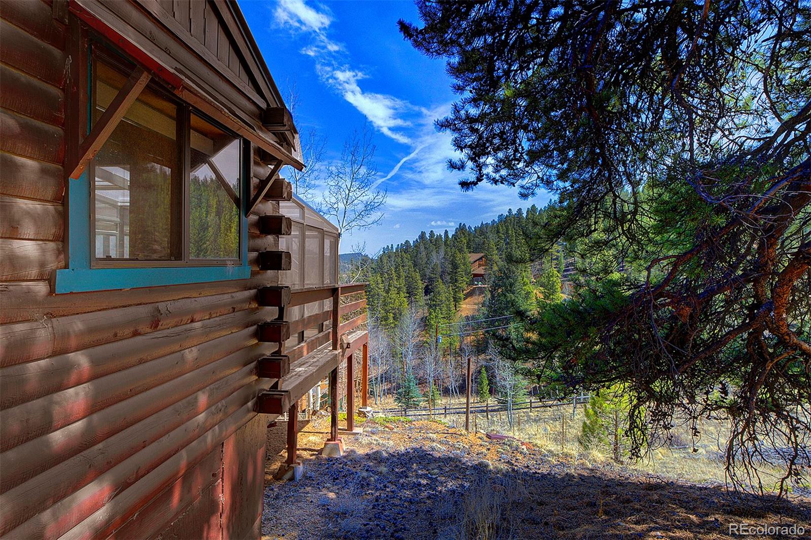 1536 Clark Road Bailey, CO 80421 - Photo 27 of 33 a view of outdoor space and deck