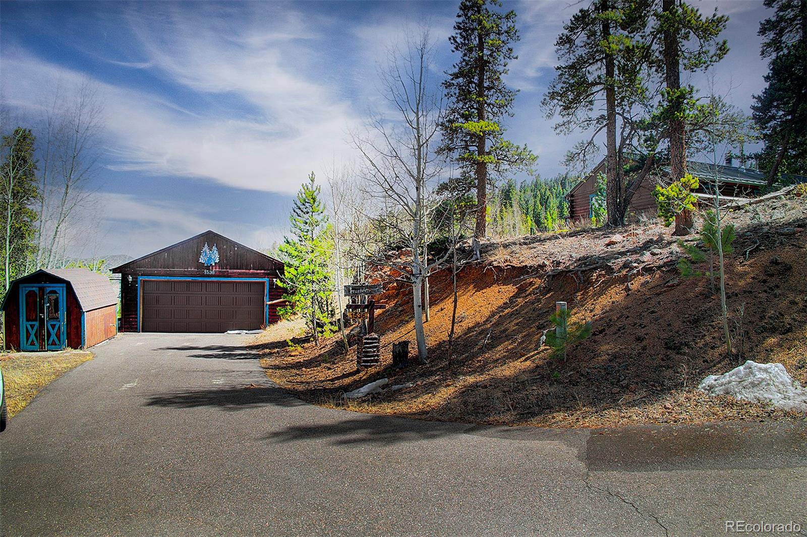 1536 Clark Road Bailey, CO 80421 - Photo 29 of 33 a view of a house with a street