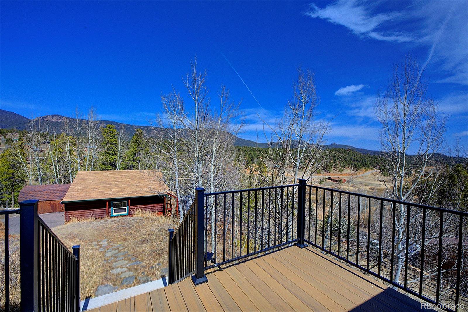 1536 Clark Road Bailey, CO 80421 - Photo 4 of 33 a view of a balcony with an outdoor space