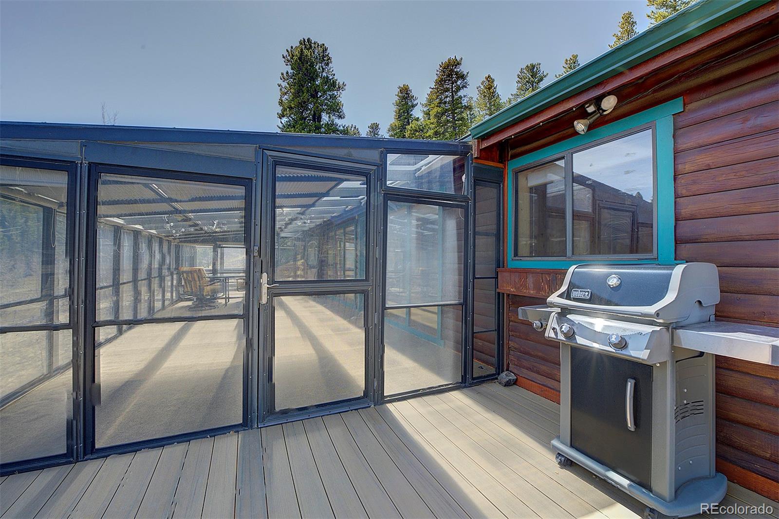 1536 Clark Road Bailey, CO 80421 - Photo 5 of 33 a view of a house with a sink and wooden floor