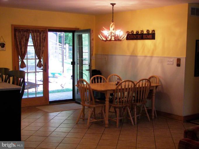 738 Cockeys Mill Road Reisterstown, MD 21136 - Photo 6 of 29 Breakfast area leads to awesome back porch!